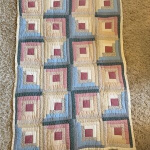 Patchwork Quilt with Blue, Pink, and Cream Accents